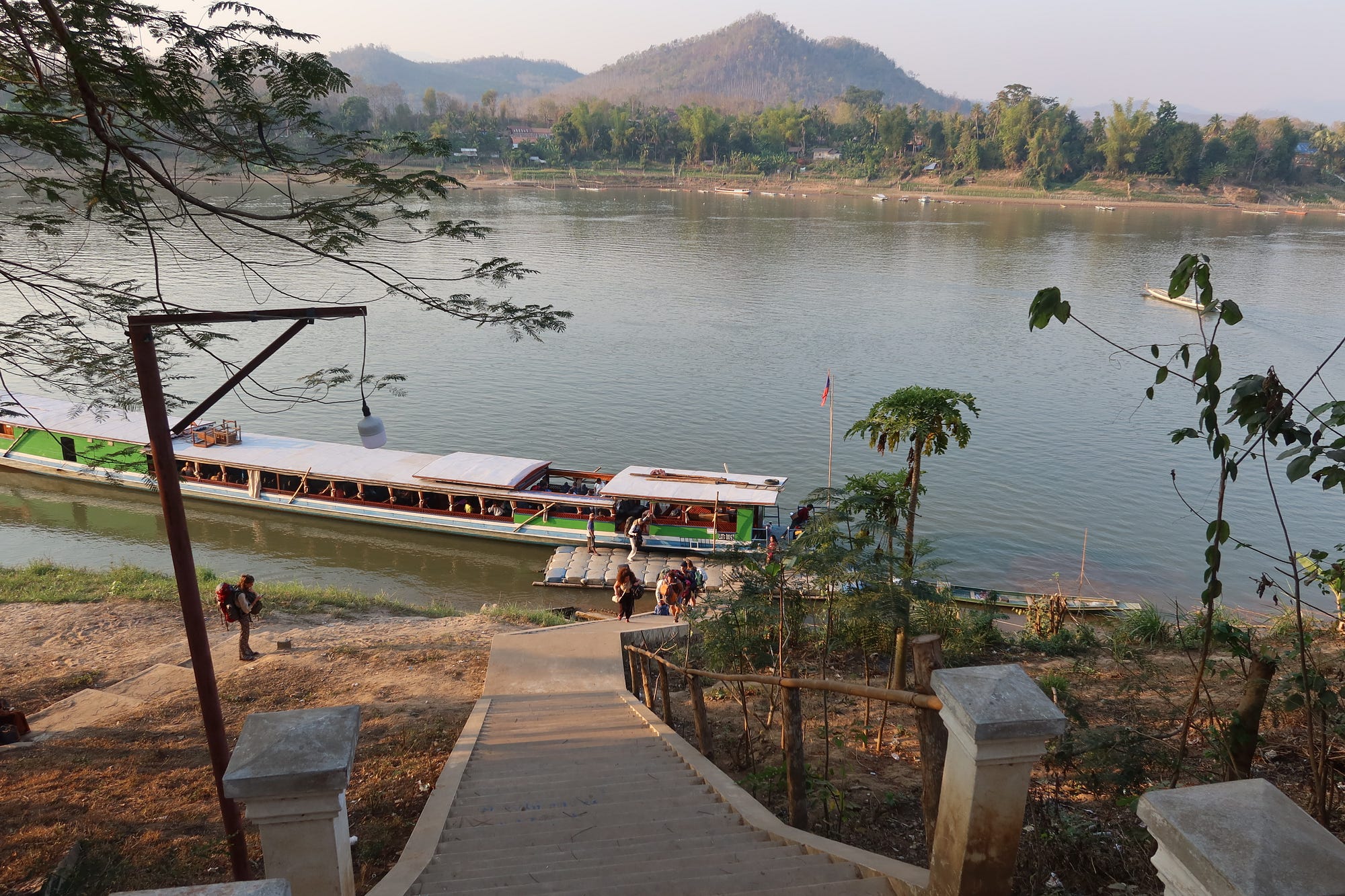 From Chiang Rai we joined many other travelers on the active (and sometimes chaotic) journey by slow boat on the Mekong River from Thailand across the border into Laos and eventually down to Luang Prabang
