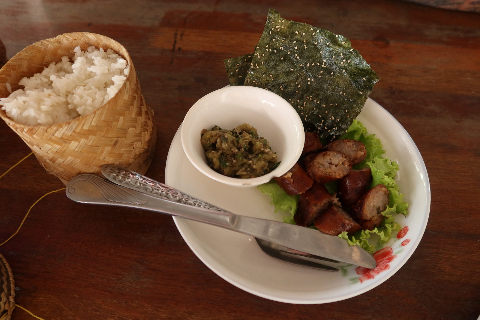 Similar to the northern Thai sausage from the last newsletter, “sai kok” is a delicious Laotian pork dish made from lemongrass, kaffir lime leaves, red chilis, garlic, shallots, and fish sauce