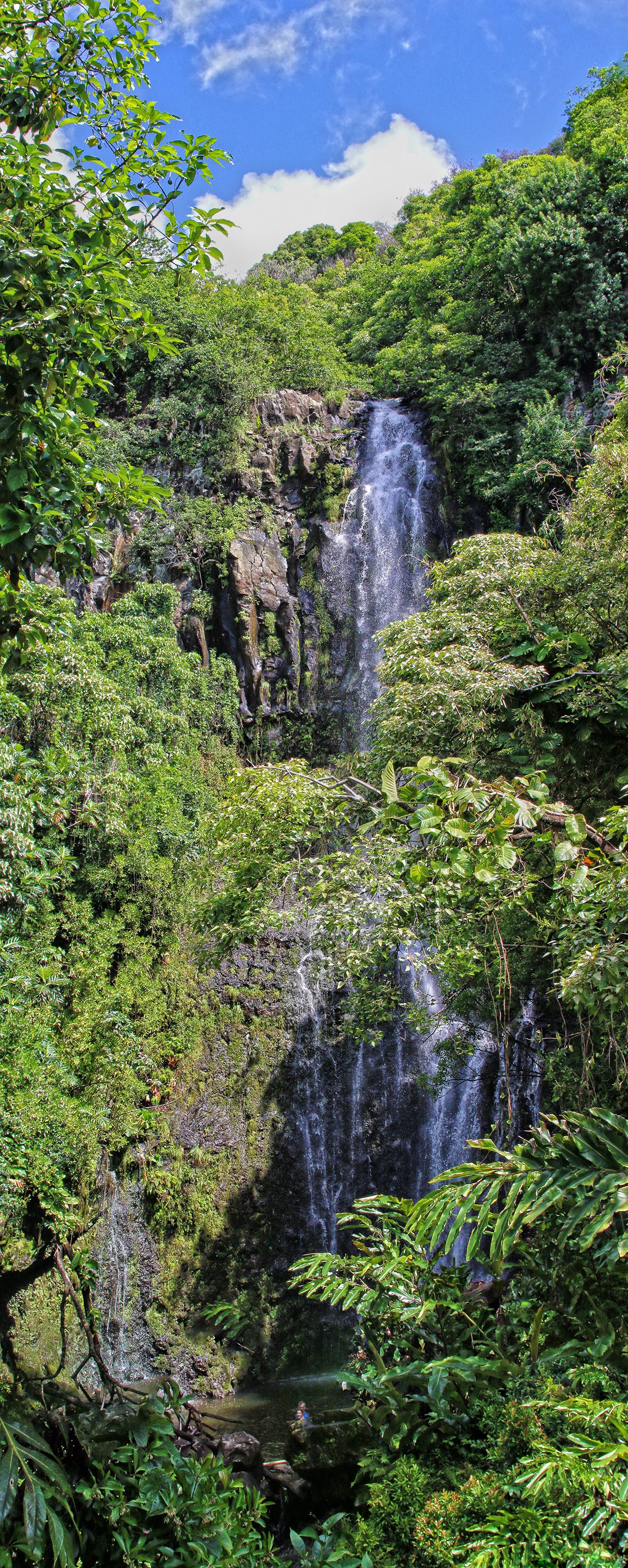 Stop G: Paihi Falls at Mile Marker #45. There is a trail to the right of the road before crossing the bridge that leads to the base of the falls, where you can take a swim